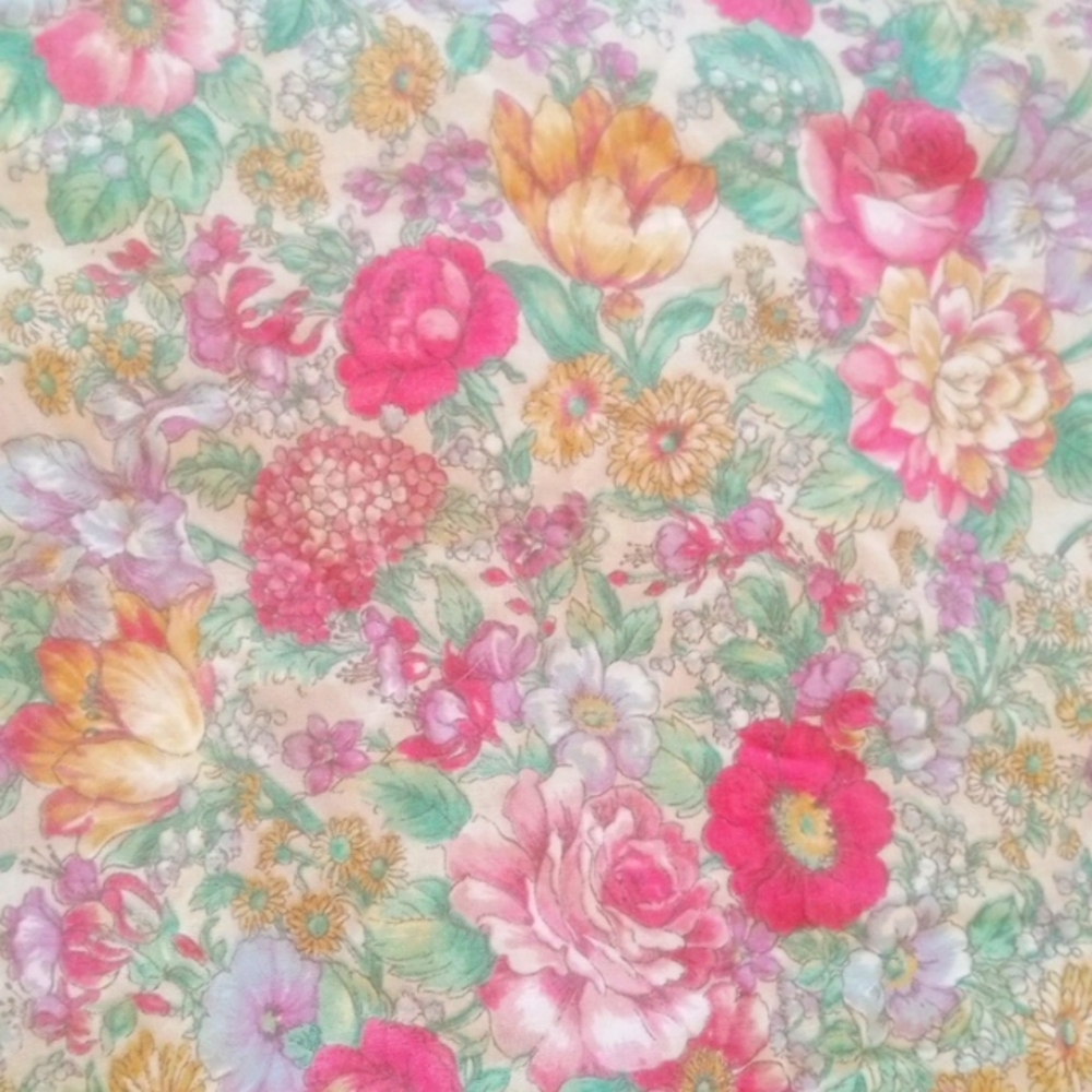 Handmade pillowcase, floweral patterned & stitched up with care for your couch.